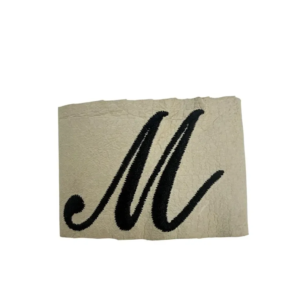 Monogram 'M' Wide Snap Cuff Bracelet in Cream with Black Lettering